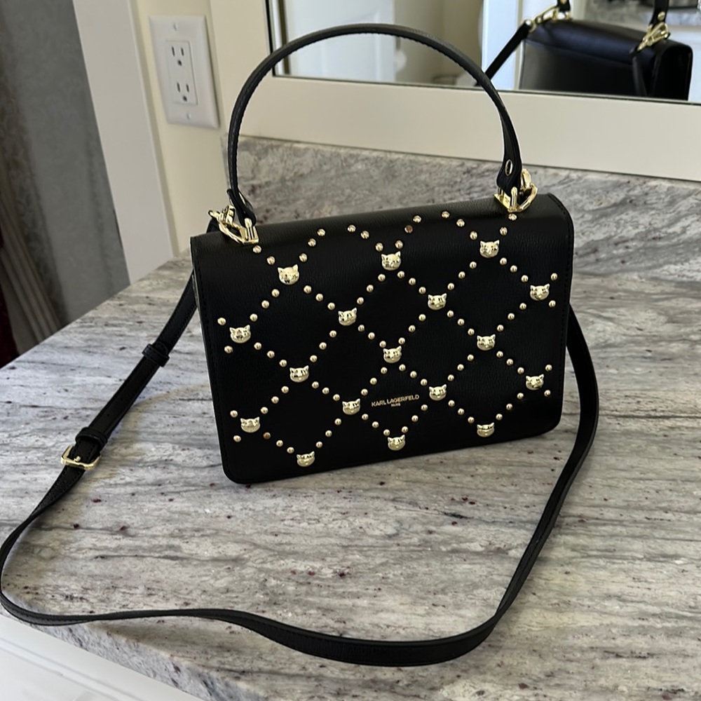 Black Karl Lagerfeld leather crossbody with gold grommets. Used once.